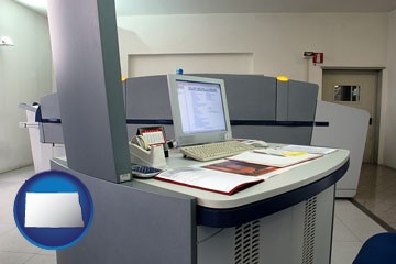 desktop publishing equipment - with North Dakota icon